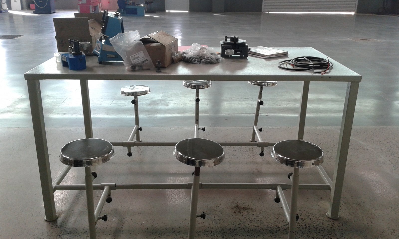 Stainless steel inspection table